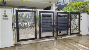 Stainless steel laser cut design folding gate with aluminium panels and tempered glass